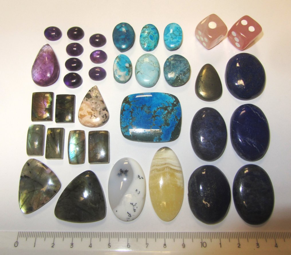 Labradorit iridescent, rodocrozit, onix zebra, calcedonie dendritică, pirite, lapislazuli, cuarț. Caboșon - Înălțime: 41.2 mm - Lățime: 19.5 mm- 160 g - (35) #1.0
