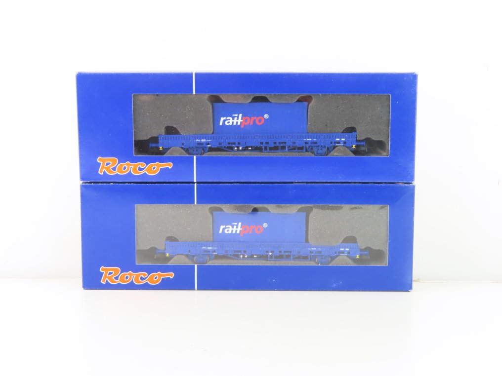 Roco H0 - 66678 - Carrozza merci di modellini di treni (2) - 2 camion a cassone aperto basso a 2 assi con carico (container) - NS #3.2