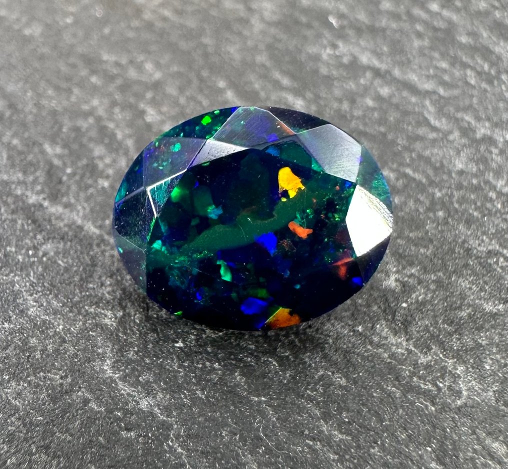 2.14 ct faceted opal Polished- 0.42 g #1.0