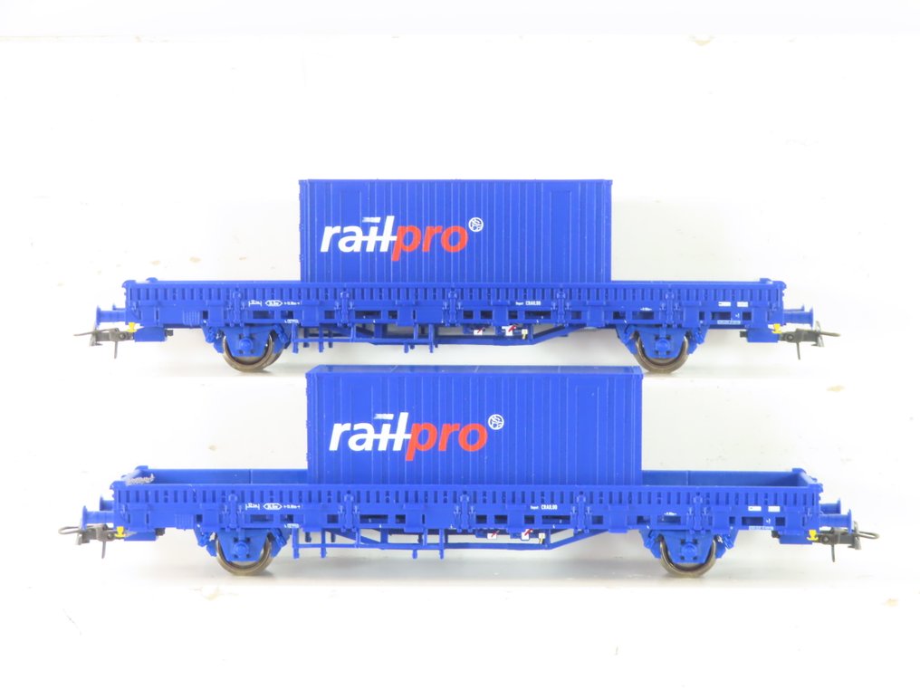 Roco H0 - 66678 - Carrozza merci di modellini di treni (2) - 2 camion a cassone aperto basso a 2 assi con carico (container) - NS #1.0