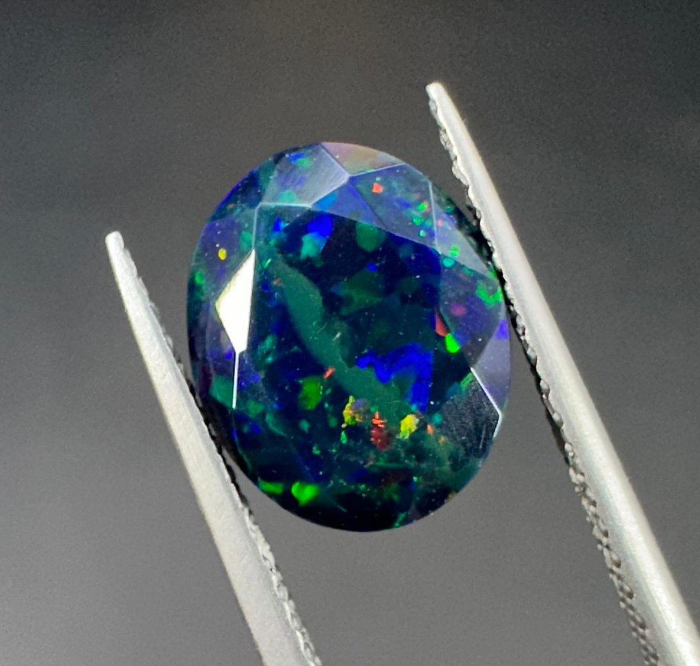 2.14 ct faceted opal Polished- 0.42 g #4.3