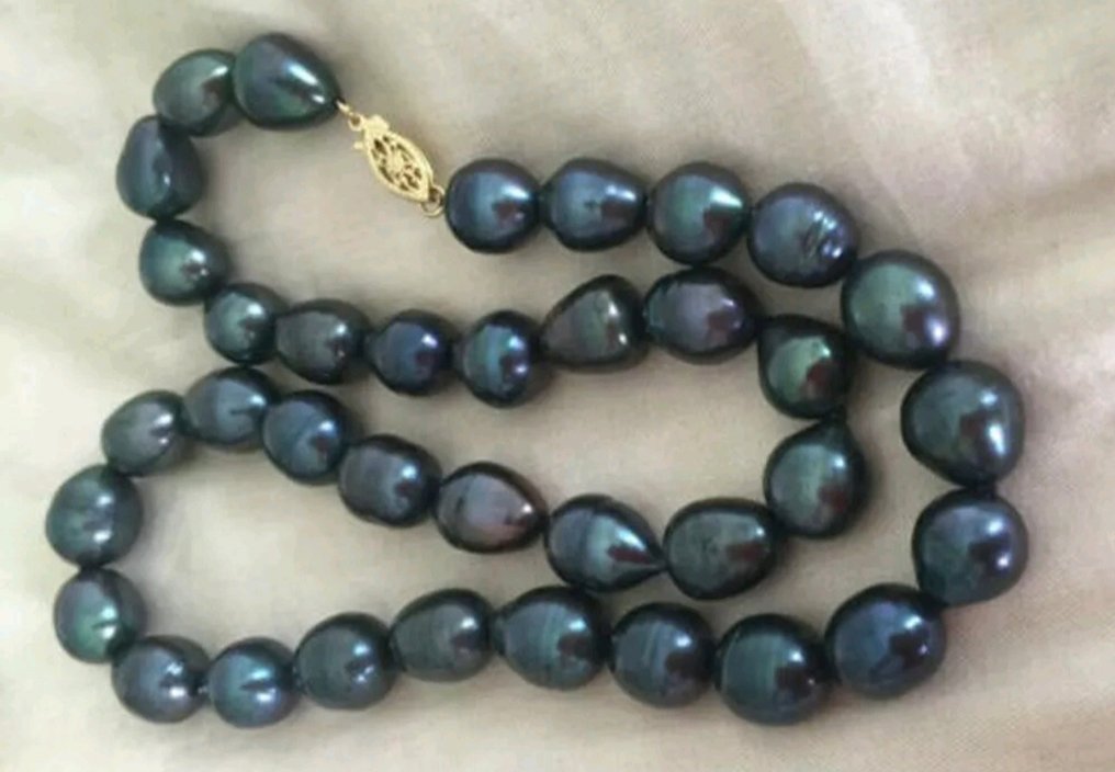 No reserve price: Tahitian pearl necklace weighing 272.60 carats. . - Height: 10 mm - Width: 12 mm- 54.52 g - (1) #3.2