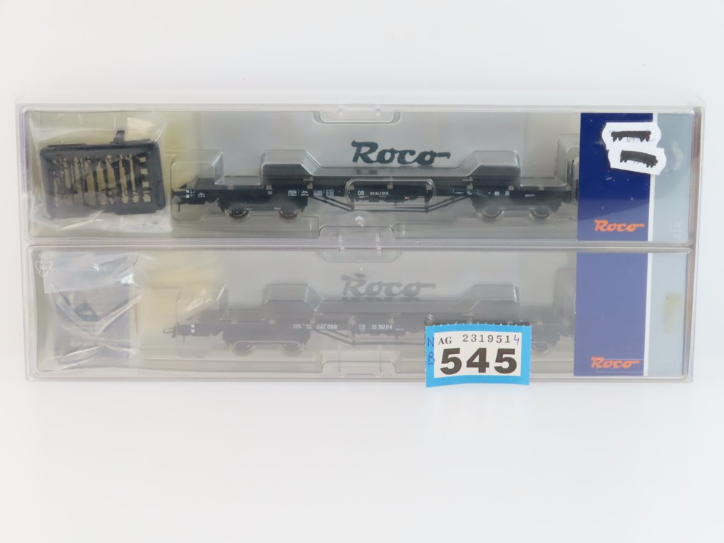 Roco H0轨 - 76195 - 模型火车货运车厢 (1) - 两件套货车，配备载荷（轨道杆）的四轴平板车。 - ÖBB #2.1