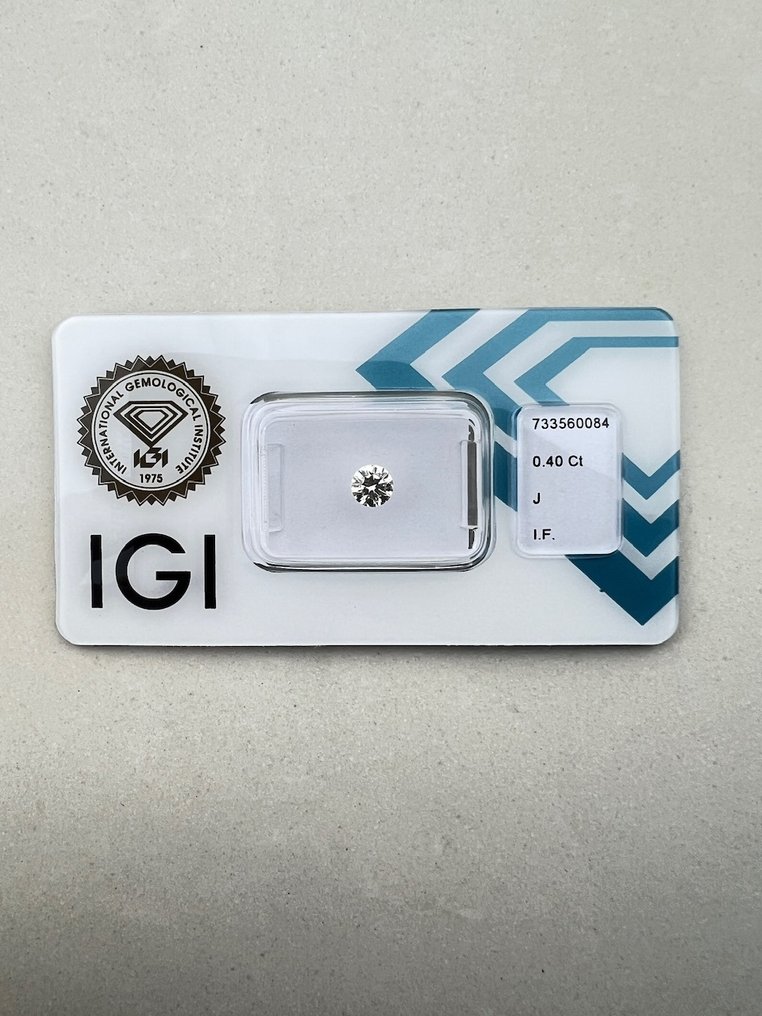 沒有保留價 - 1 pcs 鑽石 (天然) - 0.40 ct - 圓形 - J(極微黃、從正面看是亮白色) - IF - 國際寶石學院(International Gemological Institute (IGI)) #1.0