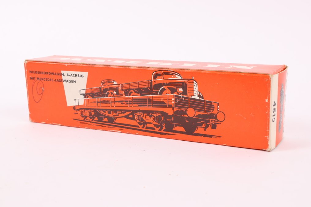 Märklin H0 - 4515 - Carrozza merci di modellini di treni (1) - Vagone piatto carico con due camion MB - DB #1.0