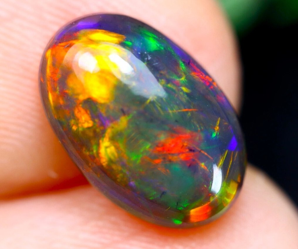 2.07 cts - Top Colors - Natural Black Opal - See Video!- 0.41 g #2.1