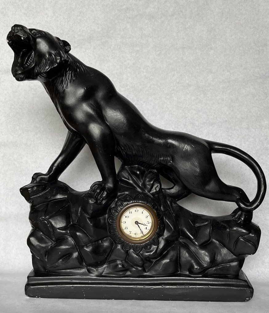 Manttelikello hahmoilla - Laasti, Messinki - 1940-1950 #1.0