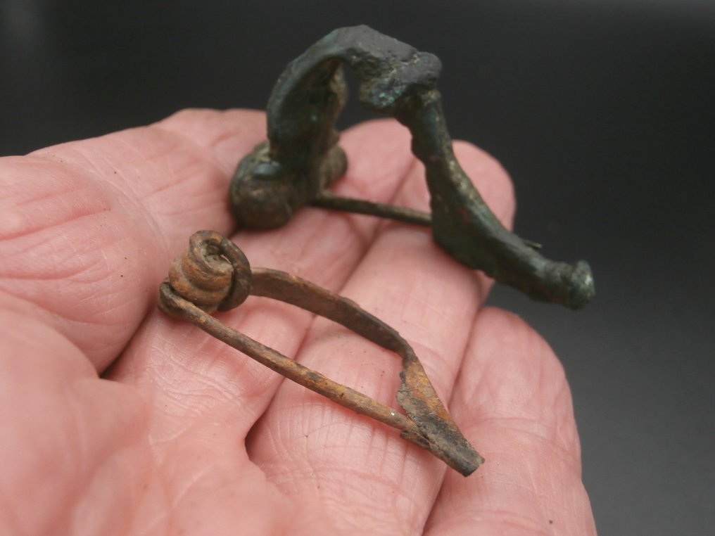 Roman period Nice lot consisting of 4 bronze Roman fibulae. (No reserve price) #4.3