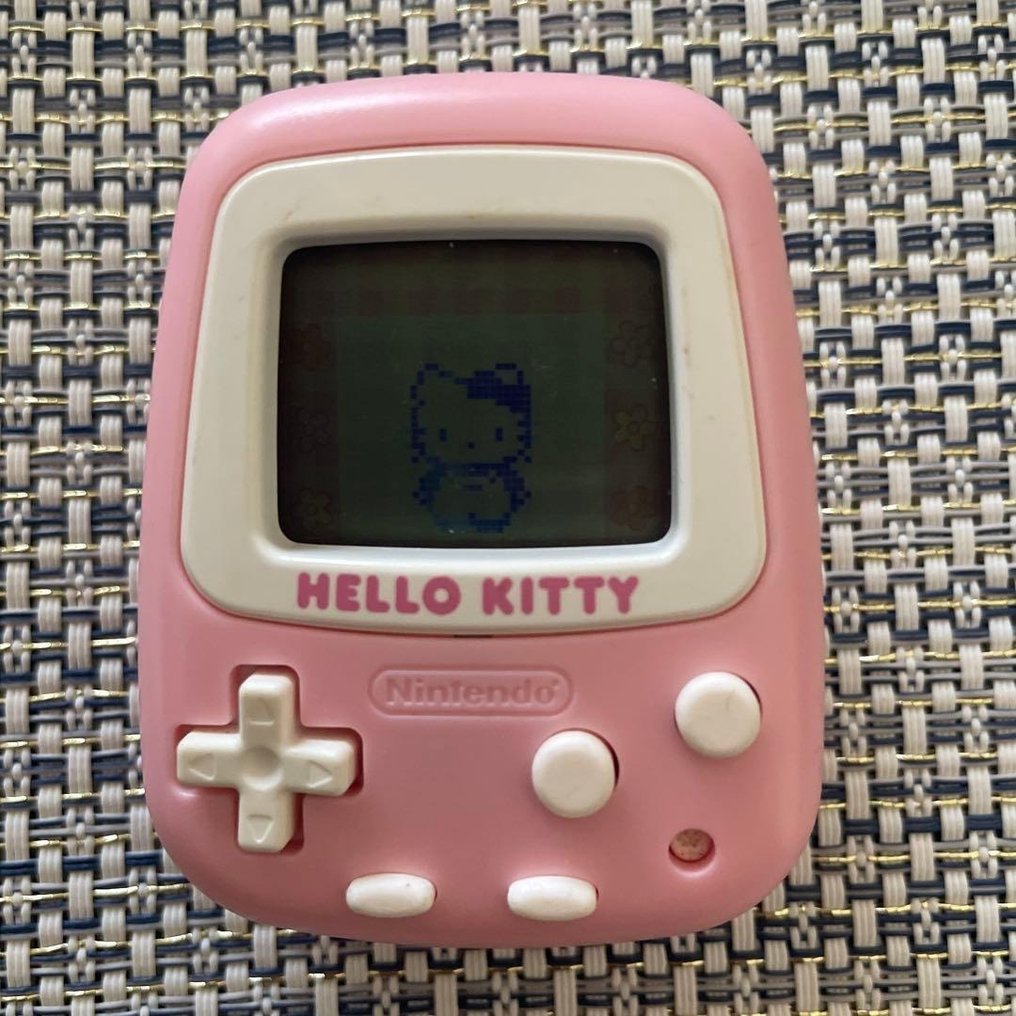 Sanrio, Nintendo - Pocket Hello Kitty virtual pet game and pedometer - Φορητή κονσόλα παιχνιδιών #1.0