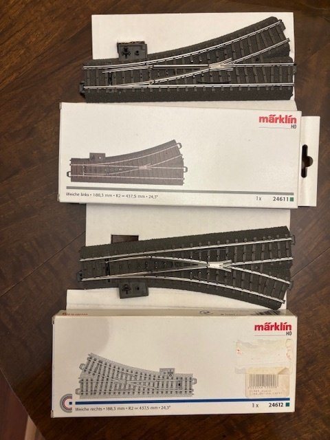 Märklin, Esu H0 - Marklin 24612x1;24611x1;6084x1; 6083x1;74470X2; 74460x6;60941x1. Esu 51820x1 - Model train tracks (14) - Set includes two Märklin H0 exchanges with boxes, various decoders, and accessories: ESU SwitchPilot #1.0