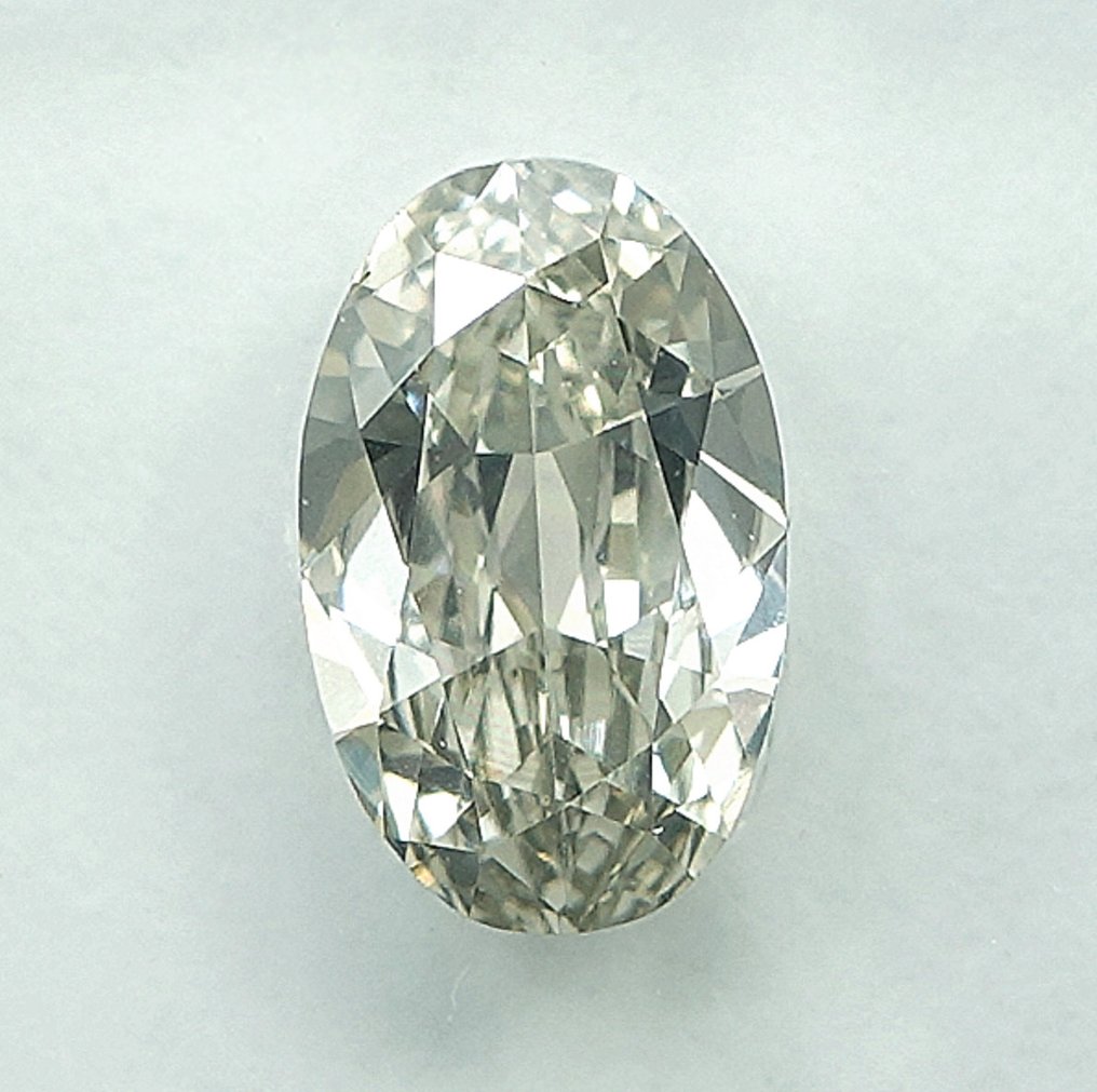 1 pcs Gyémánt  (Természetes színű)  - 0.72 ct - Ovális - Light Szürkés Sárga - SI1 - Nemzetközi Gemmológiai Intézet (IGI) #1.0