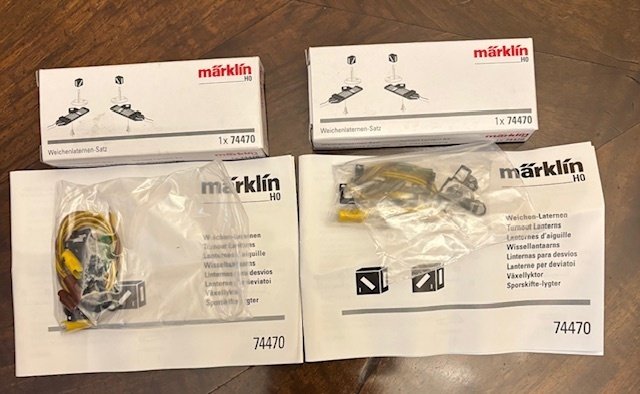 Märklin, Esu H0 - Marklin 24612x1;24611x1;6084x1; 6083x1;74470X2; 74460x6;60941x1. Esu 51820x1 - Model train tracks (14) - Set includes two Märklin H0 exchanges with boxes, various decoders, and accessories: ESU SwitchPilot #3.2
