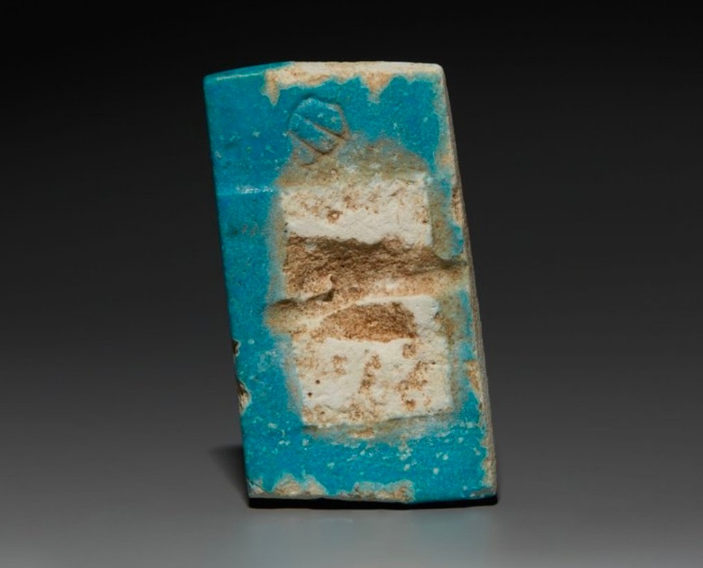 Faience tile from the step pyramid 'King's Tomb of Djoser'. - Faience - Egypt - Djoser, circa 2600 BC. #2.1