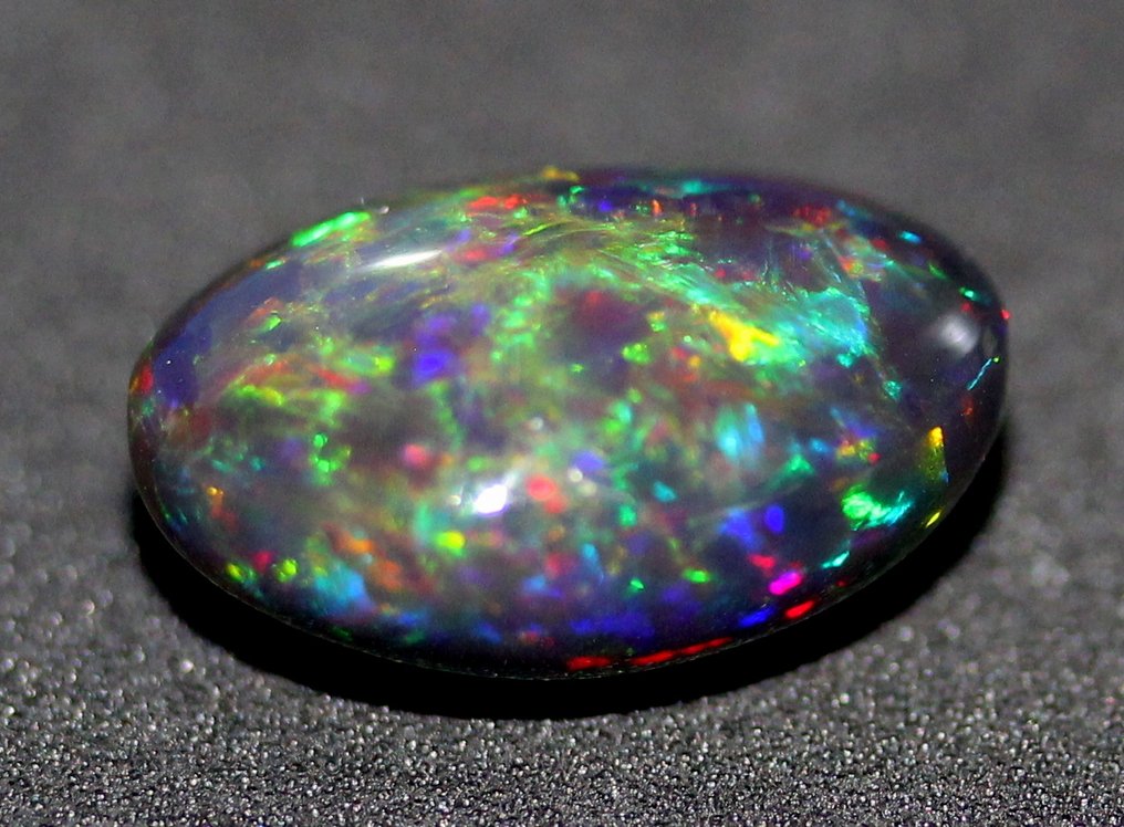 8,98 ct. – Echter schwarzer Opal mit bunten Regenbogenblitzen poliert- 1.8 g #2.1