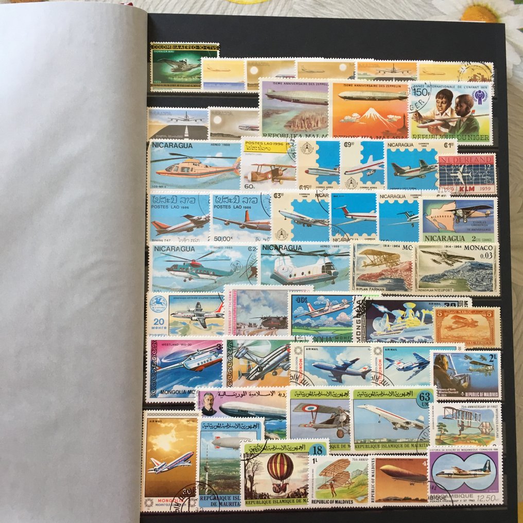 World  - Beautiful stamp collection themed: aircraft and transportation vehicles, both new and used from all #1.0