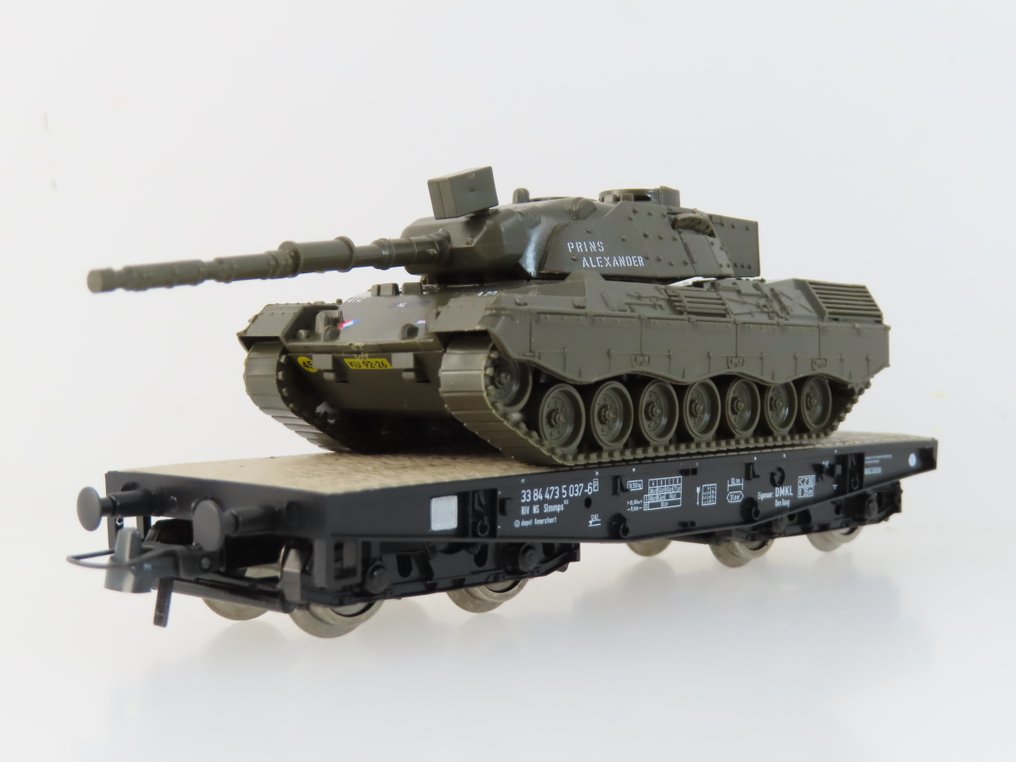 Roco H0 - 47746 - Vagão de carga de modelismo ferroviário (1) - Veículo pesado carregado com carga Leopard 1 'Prins Alexander'. - NS, DMKL #1.0