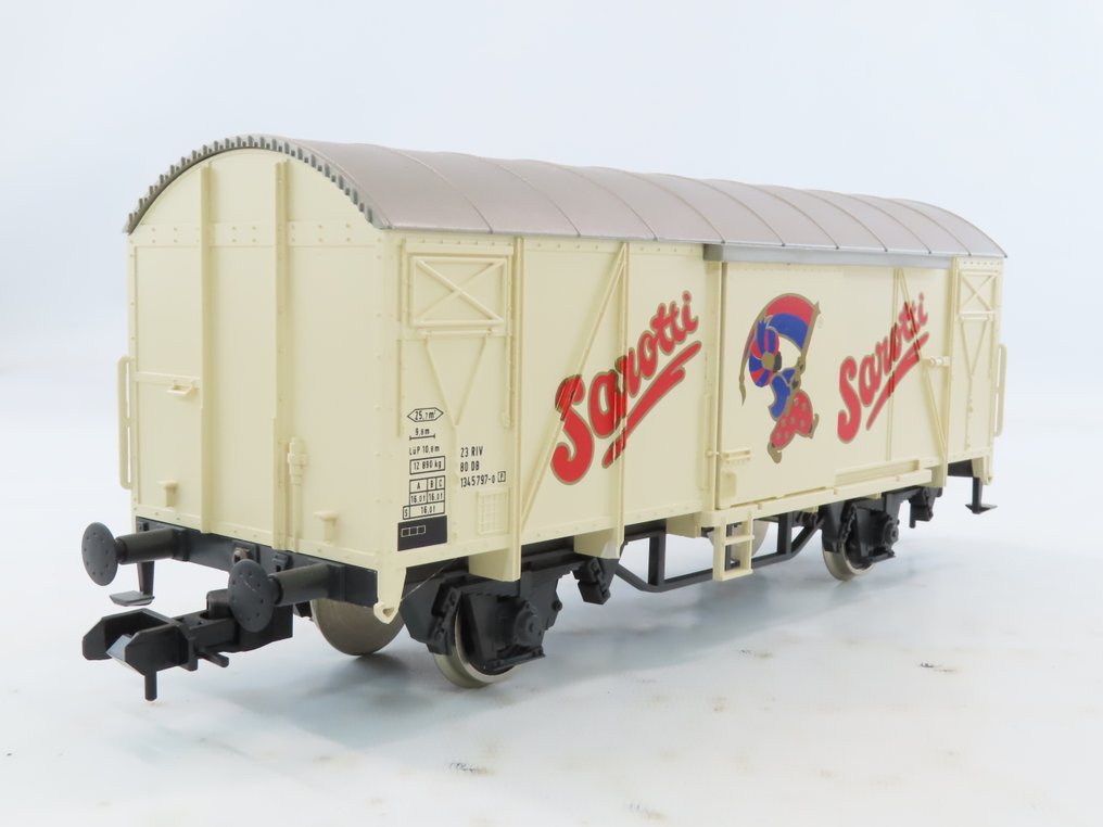 Märklin 1 - 5843 - Modellvonat teherfuvarozás (1) - 2 tengelyes zárt áruszállító kocsi 'Sarotti' felirattal. - DB #1.0