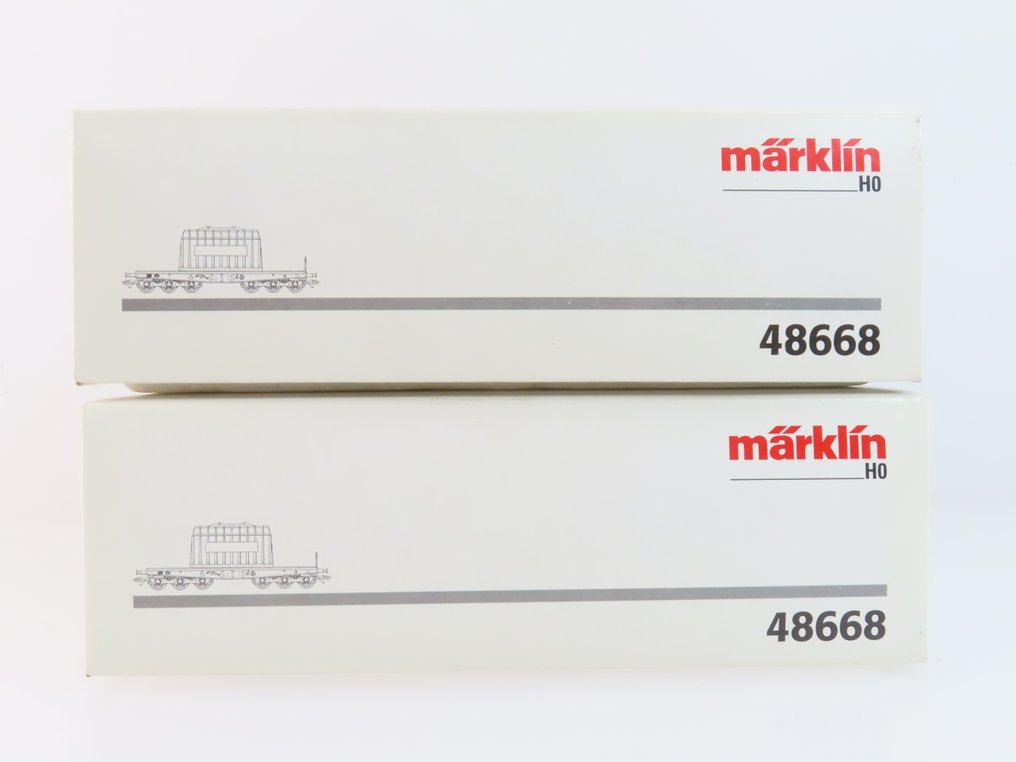 Märklin H0 - 48668 - Machetă tren transport marfă (2) - 2x vagoane platformă cu 6 axe pentru transport greu, încărcate cu transformator 'HKM'. - DB #2.1