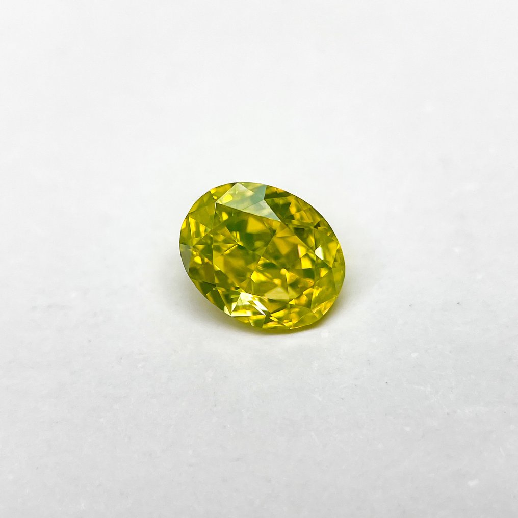 1 pcs 钻石 (天然色彩的) - 0.73 ct - 椭圆形 - Fancy vivid 稍帶綠色的 黄色 - VS1 轻微内含一级 - 美国宝石研究院(GIA) #2.1