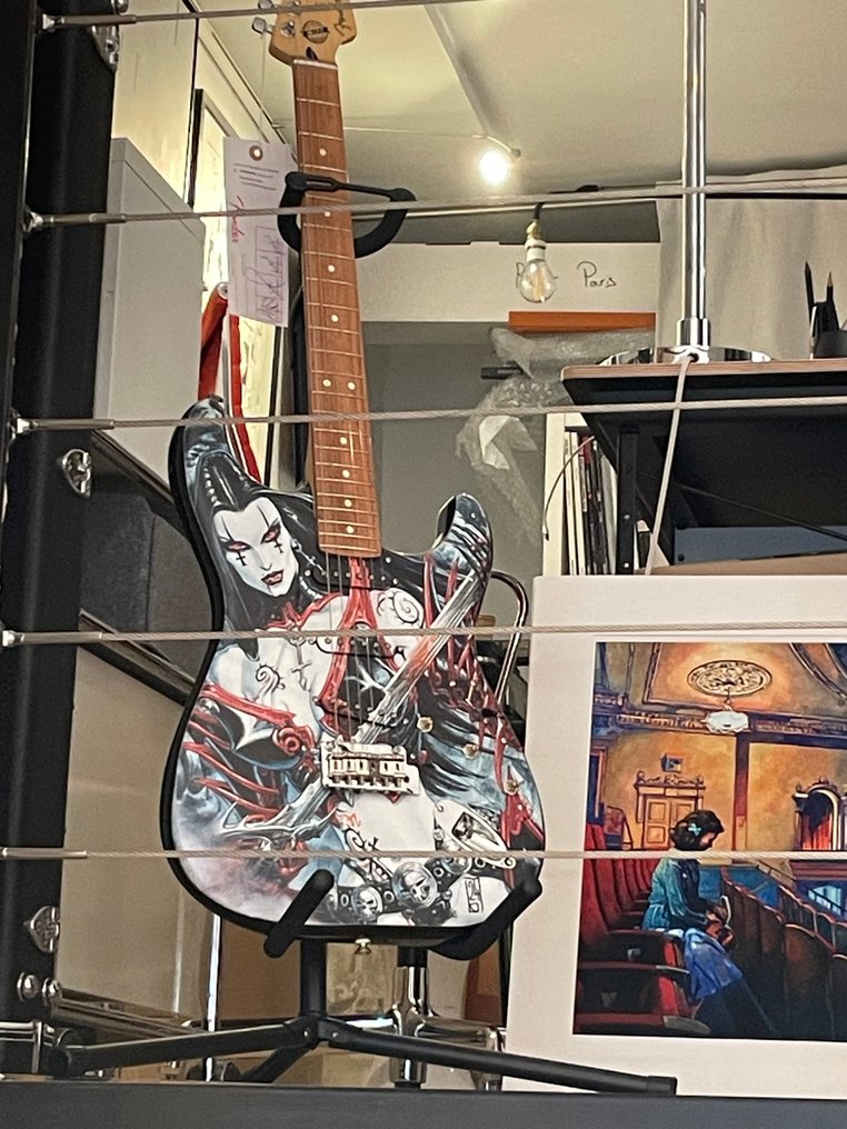 "Claudia" - Guitar, Fender Stratocaster decorated with a drawing by Olivier Ledroit. - 2024 - Certificate, Limited & numbered edition, Hand signed in person #1.0