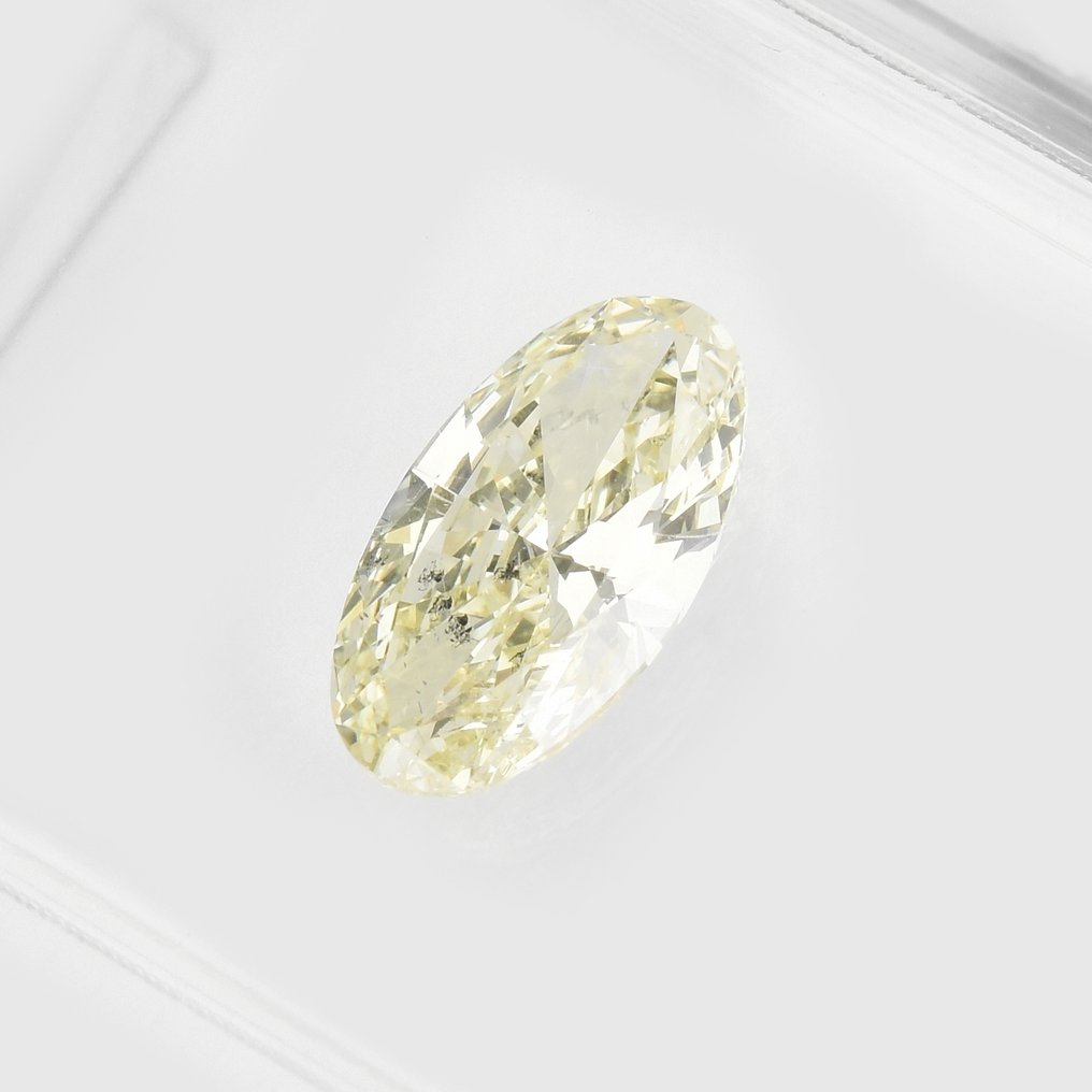1 pcs Diamant  (Naturligt färgad)  - 0.60 ct - Oval - Light Gul - SI2 - International Gemological Institute (IGI) #1.0