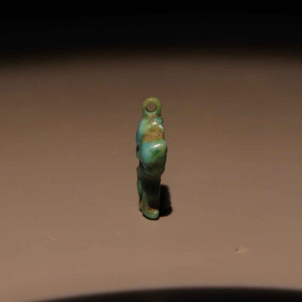 Αρχαία Αιγυπτιακή Faience Χάντρα κολιέ του Θεού Μπε. Νεότερη Βασιλεία, 18η Δυναστεία, περ. 1575–1295 π.Χ. Ύψος 1,3 εκ. (χωρίς τιμή ασφαλείας) #3.2