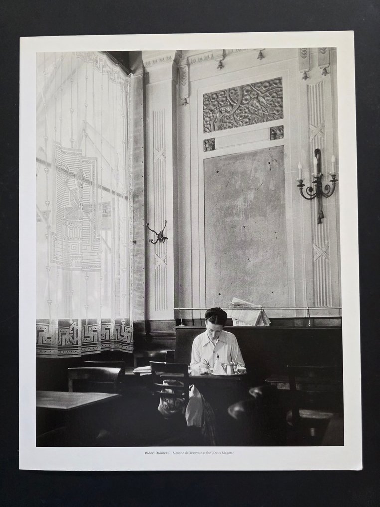 Robert Doisneau (1912–1994) - Simone de Beauvoir au café "Les deux magots", Paris, 1944 #1.0