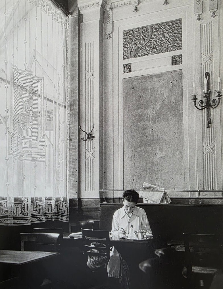 Robert Doisneau (1912–1994) - Simone de Beauvoir au café "Les deux magots", Paris, 1944 #1.0