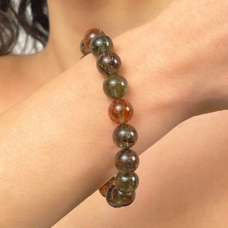 Bracelet strung on elastic with spheres of natural rutile quartz. Ø 11/11.5 mm, 20 cm- 35 g - (1) #1.0