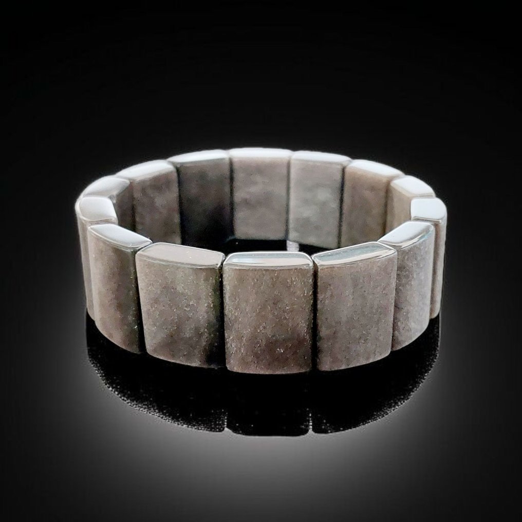 Silver obsidian with superb reflections. Rare natural untreated stone. - Height: 2 cm - Width: 0.6 cm- 60 g #1.0