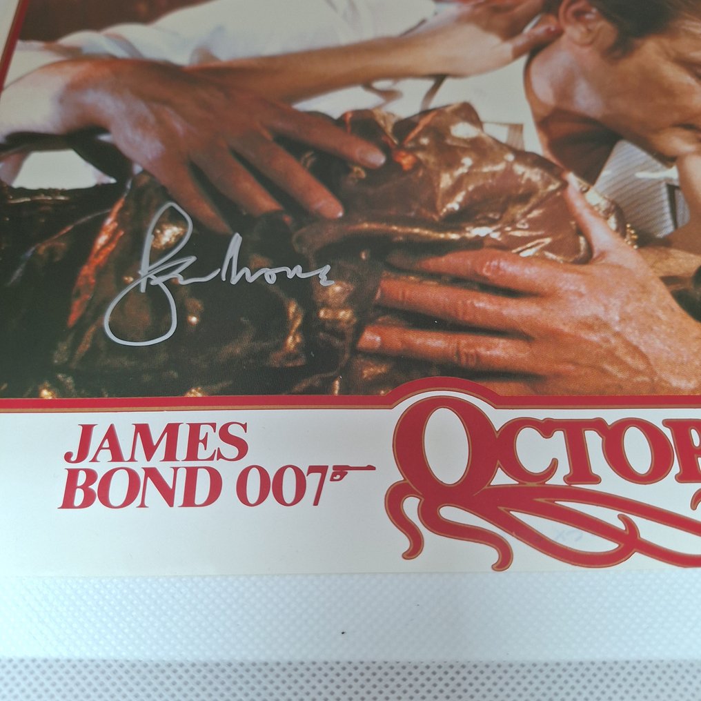 James Bond 007: Octopussy - signed by Roger Moore as 007 (+2017) Rare Vintage Lobby Card - signed with Certified Genuine bc #2.1