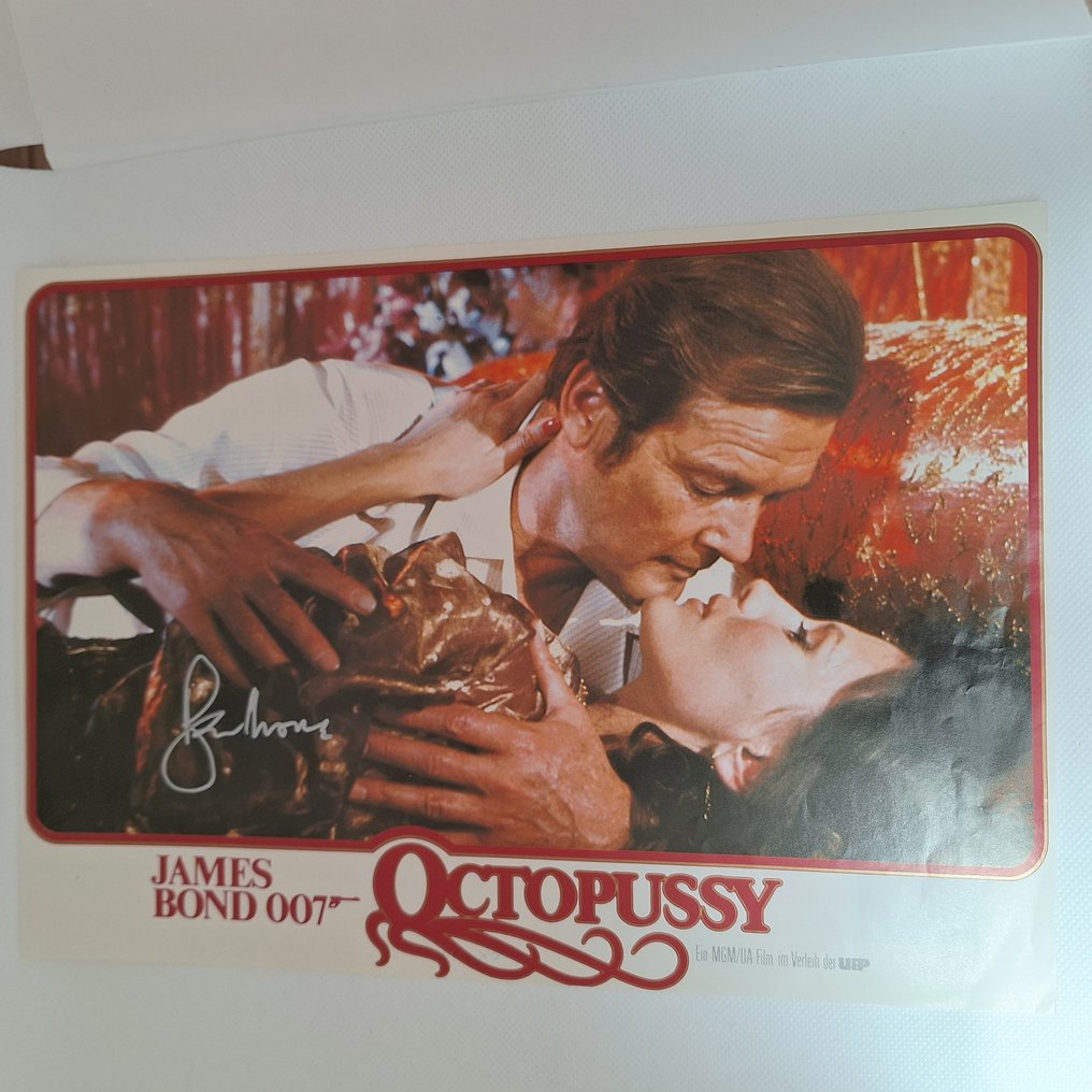 James Bond 007: Octopussy - signed by Roger Moore as 007 (+2017) Rare Vintage Lobby Card - signed with Certified Genuine bc #1.0
