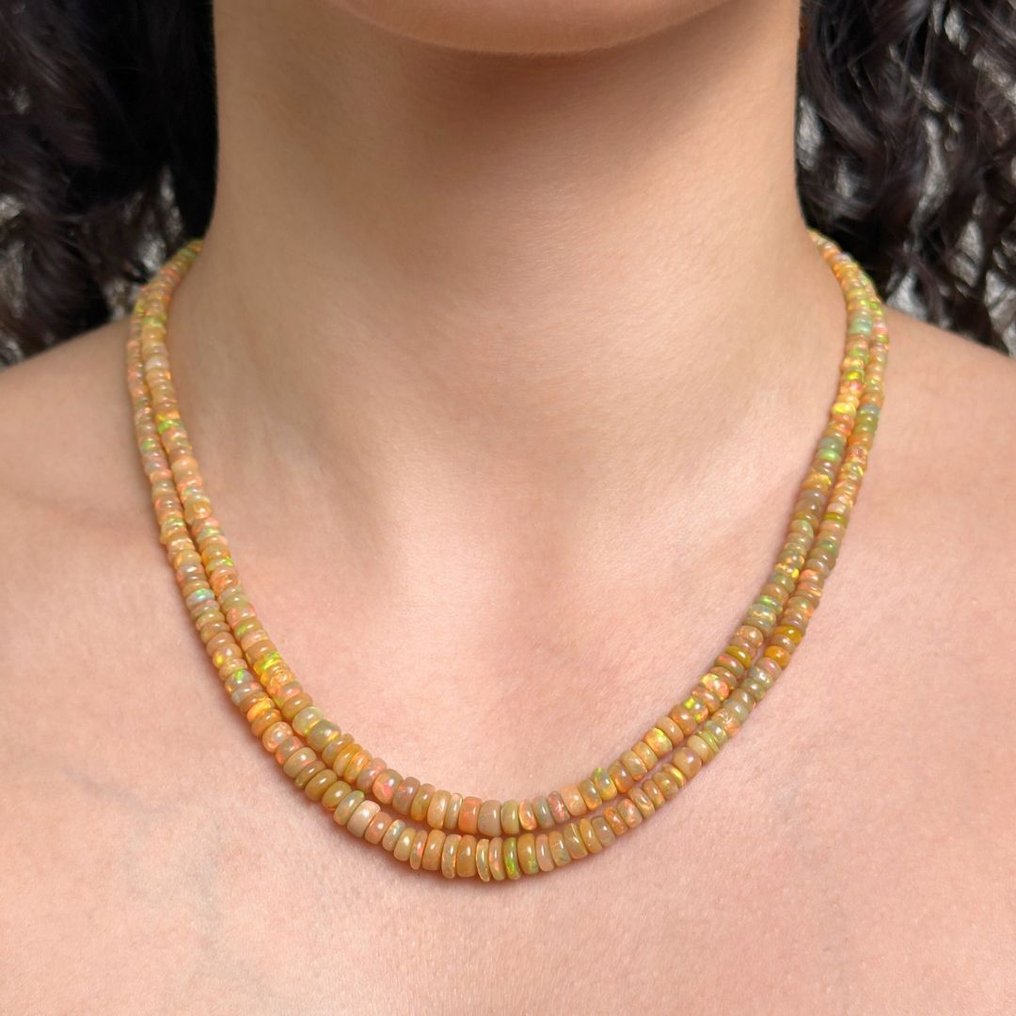 Necklace set on a bezel, two parallel wires of natural Ethiopian opal, 95 carats, graduated disc. and the bolt clasp in gilded 925‰ silver ø 3/6.5 mm, 1st wire 45 cm- 19 g - (1) #1.0