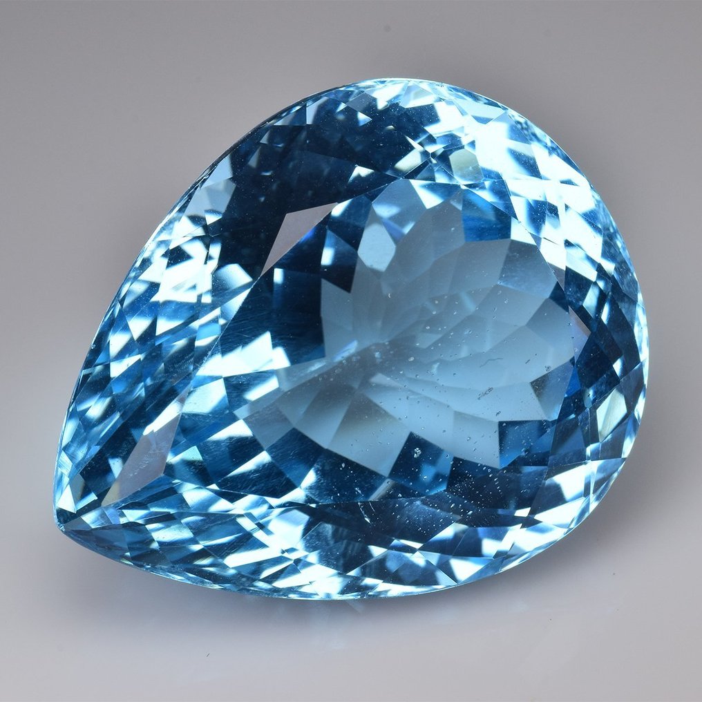 1 pcs Blå Topas - 76.70 ct - Antwerp Laboratory for Gemstone Testing (ALGT) - Schweizerblå #1.0
