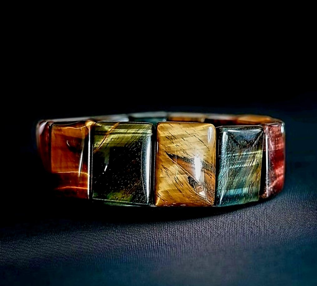 Bellissimo bracciale in occhio di tigre multicolore. Pietra veramente naturale non trattata, molto luminosa. - Altezza: 2 cm - Larghezza: 0.6 cm- 65 g #4.3