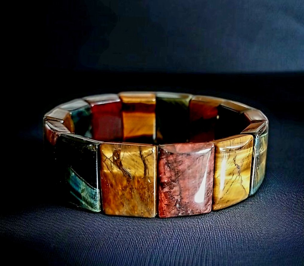 Bellissimo bracciale in occhio di tigre multicolore. Pietra veramente naturale non trattata, molto luminosa. - Altezza: 2 cm - Larghezza: 0.6 cm- 65 g #1.0