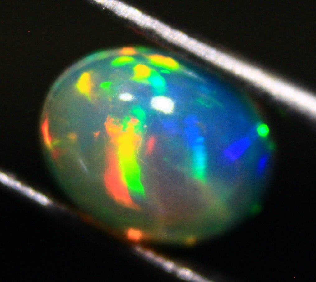 Ct. 4.20 Φυσικά Αιθιοπικά Οπάλια - Καμπουσόν - Ύψος: 9 mm - Πλάτος: 7 mm- 0.84 g - (4) #2.1