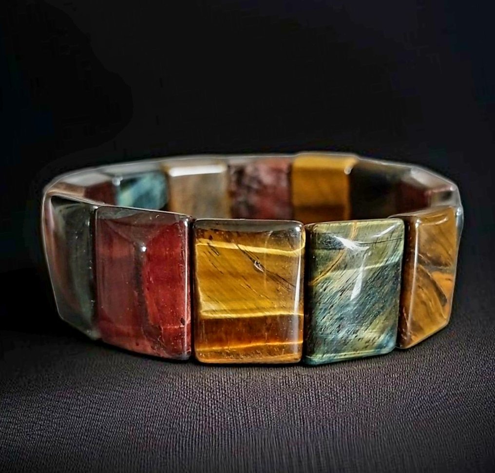 Bellissimo bracciale in occhio di tigre multicolore. Pietra veramente naturale non trattata, molto luminosa. - Altezza: 2 cm - Larghezza: 0.6 cm- 65 g #1.0