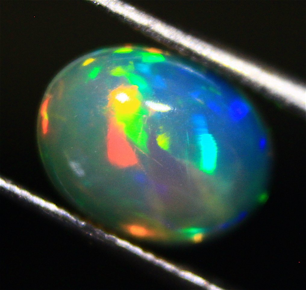 Ct. 4.20 Φυσικά Αιθιοπικά Οπάλια - Καμπουσόν - Ύψος: 9 mm - Πλάτος: 7 mm- 0.84 g - (4) #1.0