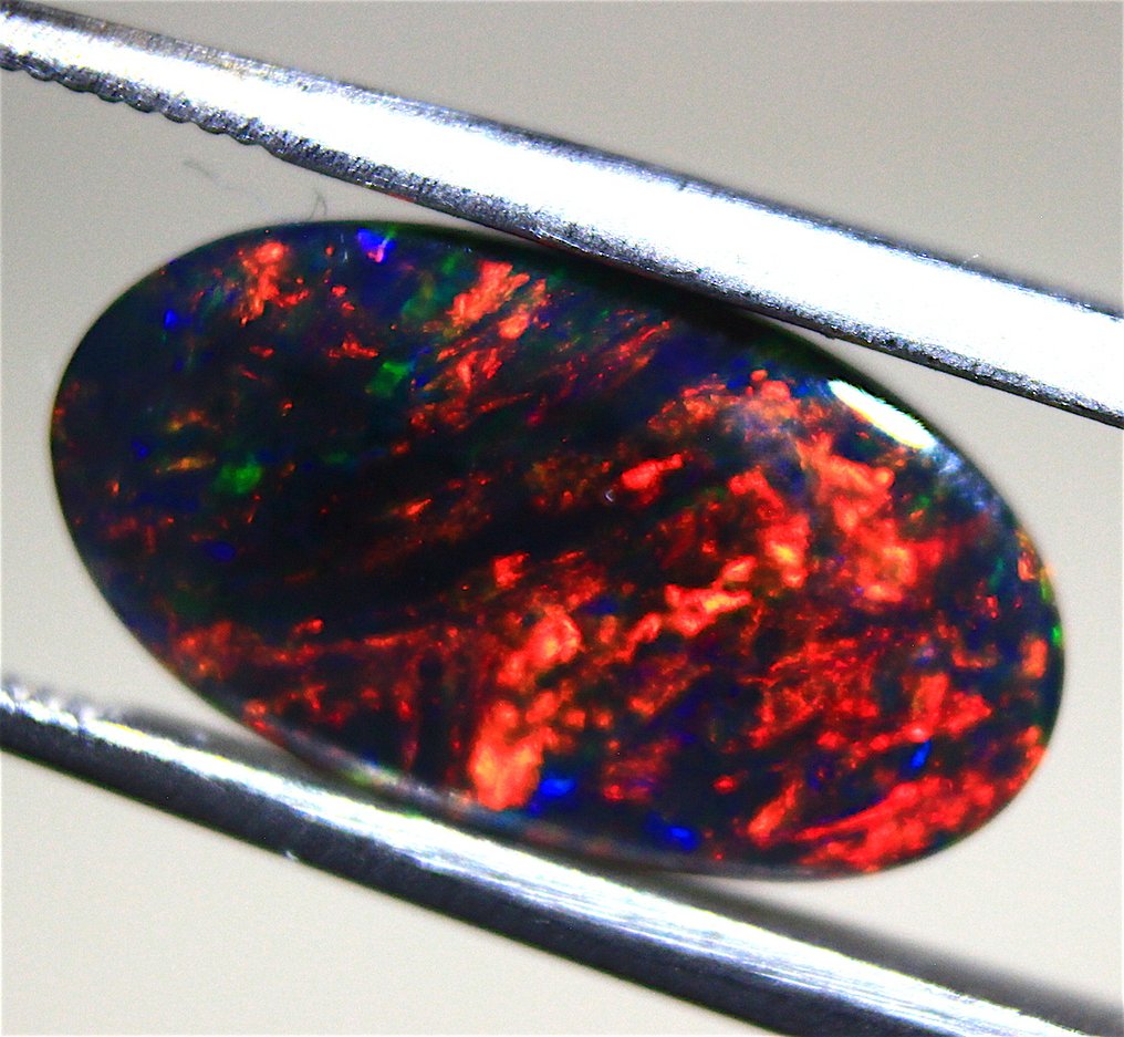 Cts. 3.50  Natural Ethiopian Black Opal Cabochon - Altezza: 18 mm - Larghezza: 15 mm- 0.7 g #4.3