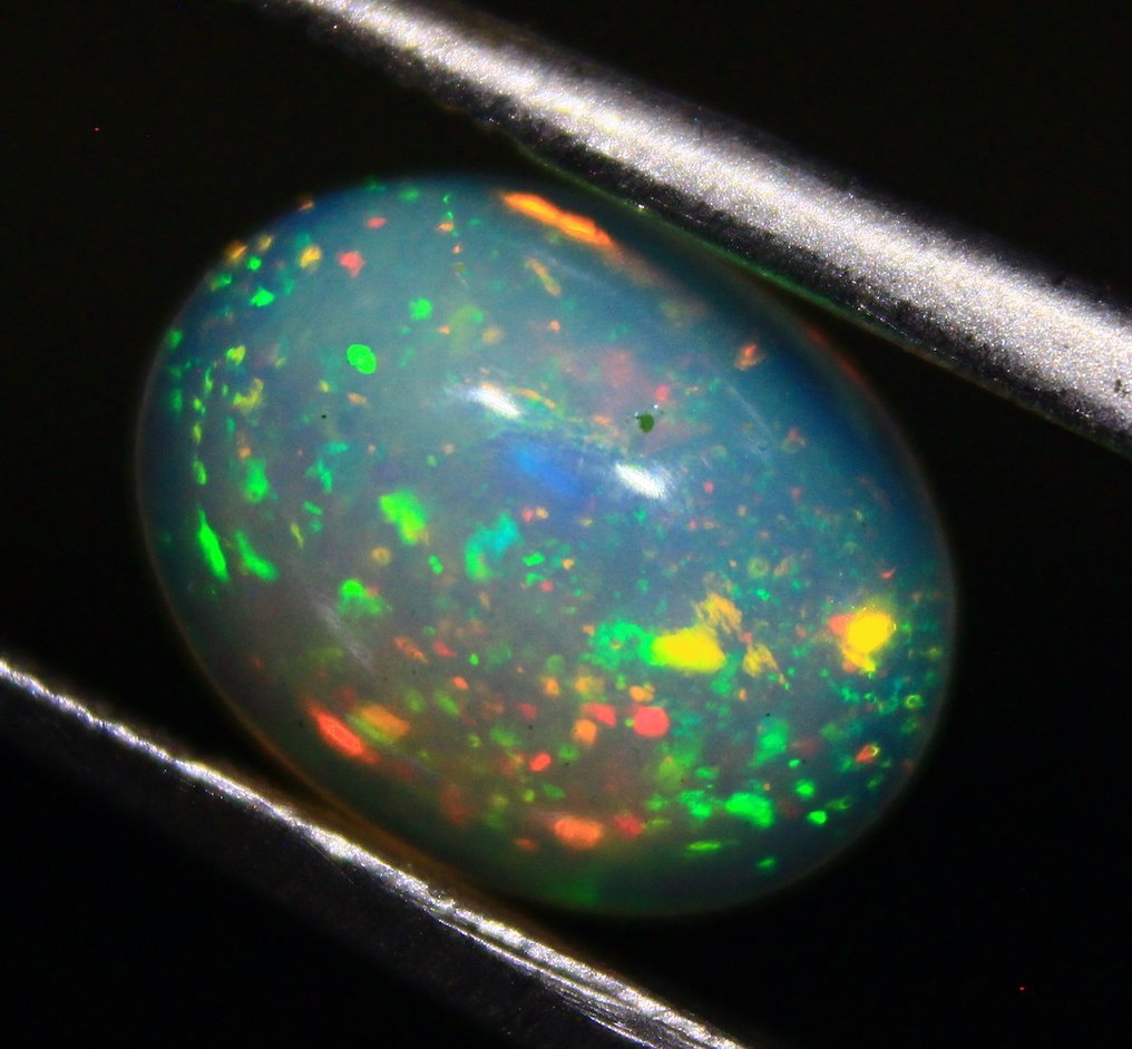 Ct. 4.20 Φυσικά Αιθιοπικά Οπάλια - Καμπουσόν - Ύψος: 9 mm - Πλάτος: 7 mm- 0.84 g - (4) #4.3