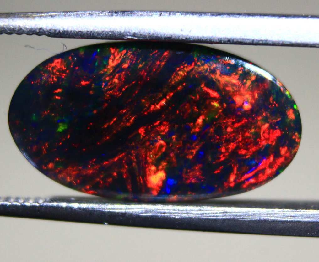 Cts. 3.50  Natural Ethiopian Black Opal Cabochon - Altezza: 18 mm - Larghezza: 15 mm- 0.7 g #2.1