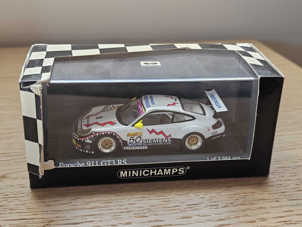 Minichamps 1:43 - Rennwagenmodell - Freisinger Motorsport Porsche 911 GT3-RS #50 : Marc Lieb / Stéphane Ortelli / Romain Dumas - Sieger 24 Stunden Spa Francorchamps 2003 #2.1