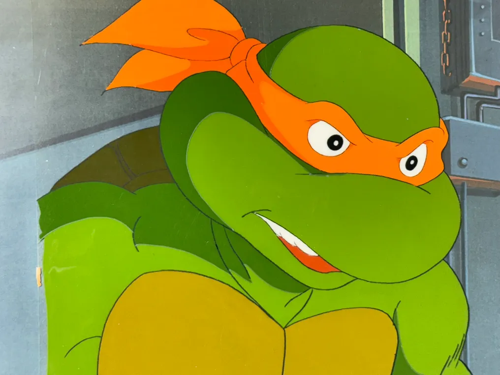 TMNT — Michelangelo original animation cel with studio seal and background