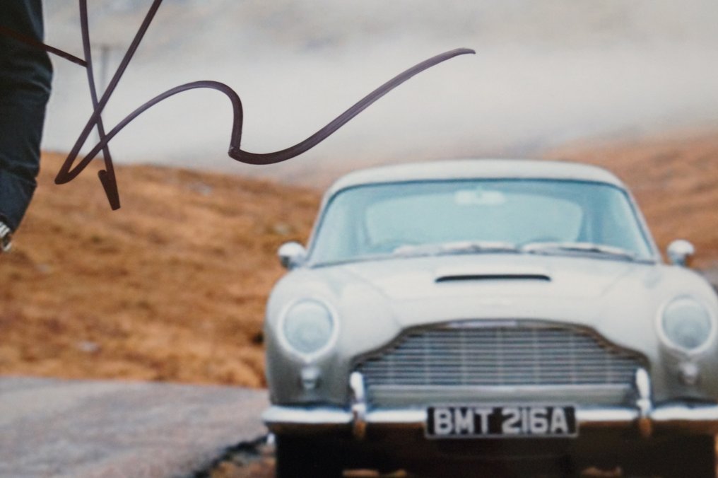 James Bond 007: Skyfall - Daniel Craig is James Bond 007 with his Aston Martin DB5 - autopgraph, photo, signed with Certified #4.3