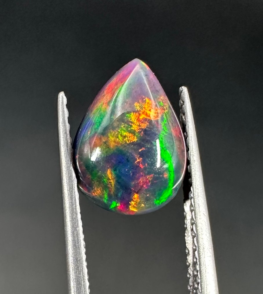 1,30ct sort opal Cabochon- 0.26 g #1.0