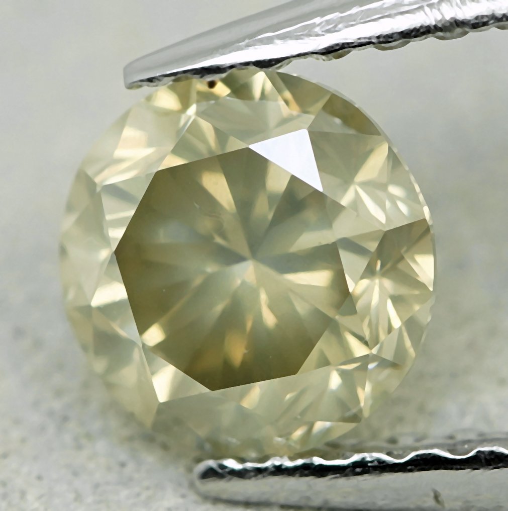 1 pcs 钻石 (天然色彩的) - 0.69 ct - 圆形 - Fancy 稍帶灰色的 黄色 - I1 内含一级 - 安特卫普宝石报告(GRA) #2.1