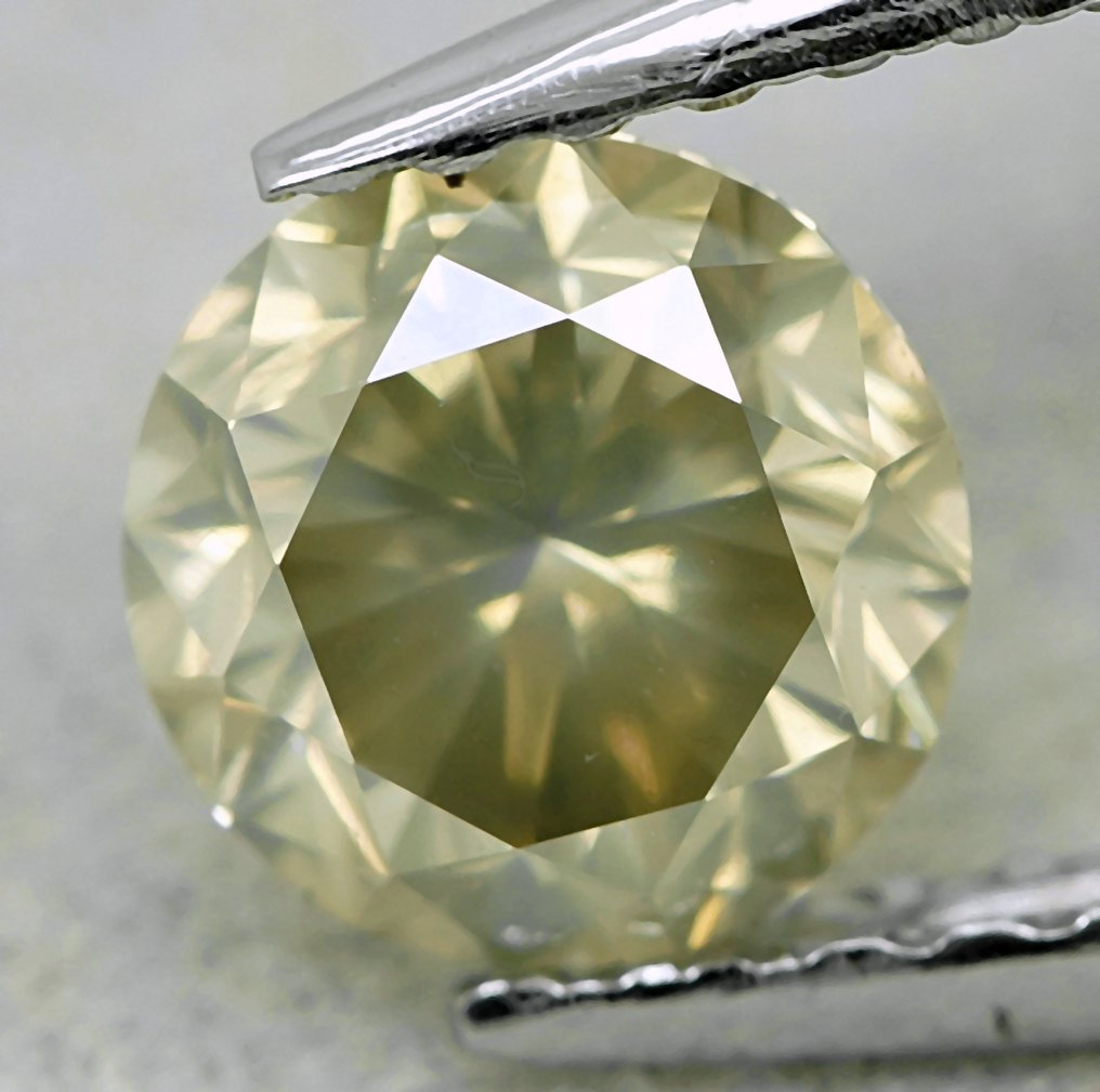 1 pcs 钻石 (天然色彩的) - 0.69 ct - 圆形 - Fancy 稍帶灰色的 黄色 - I1 内含一级 - 安特卫普宝石报告(GRA) #1.0