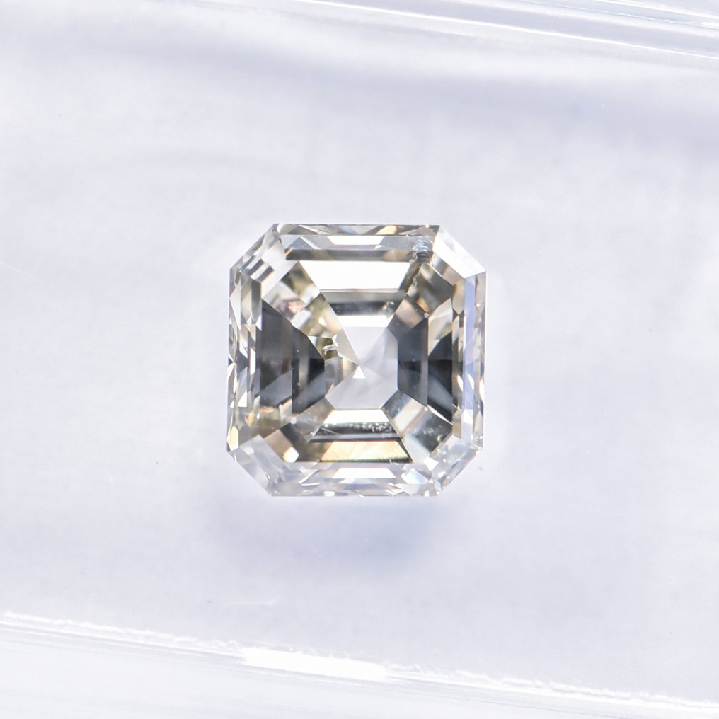 Ingen reservasjonspris - 1 pcs Diamant (Naturfarget) - 1.36 ct - Smaragd - Fancy Grå, Oransje Gul - SI1 - Det internasjonale gemologiske institutt (IGI) - VG #3.2
