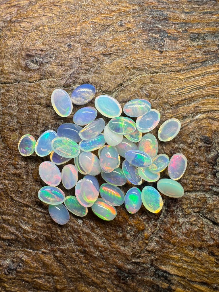 Σετ 42 λευκών οπαλίων από την Αιθιοπία. 12,35 καράτια. Χωρίς τιμή ελάχιστης αποδοχής. Ωοειδές- 2.47 g - (42) #1.0